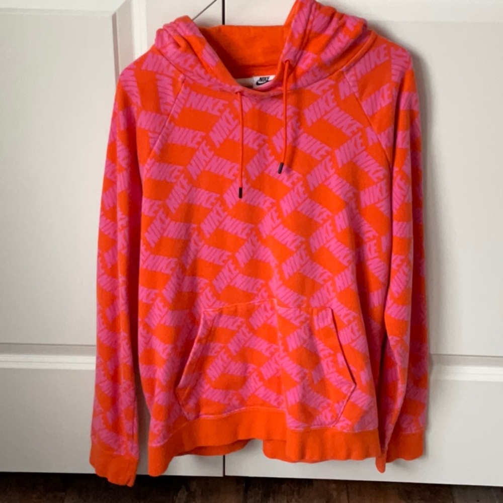 Orange and pink Nike hoodie.